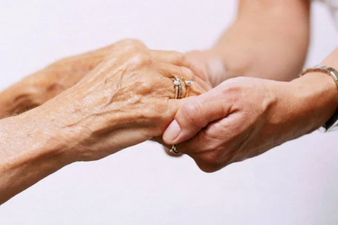 hand holding hand holding